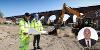 L/R Site Foreman Dave Nappy and Darren Porteous Highways Supervisor study plans while excavator digs at new site of Yarm long-stay car park