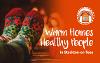 A picture of feet covered by socks on a table with the accompanying text "Warm Homes Healthy People in Stockton-on-Tees"