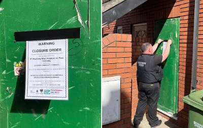 Enforcement Officer puts up a final Closure Order on Wembley Way