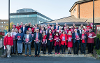 SBC councillors stood together holding Show Racism the Red Card posters