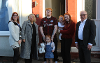 Photo of new tenants outside house in Thornaby with Cllr Nigel Cooke